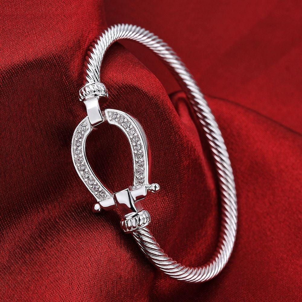 Silver crystal horse shoe bangle / bracelet