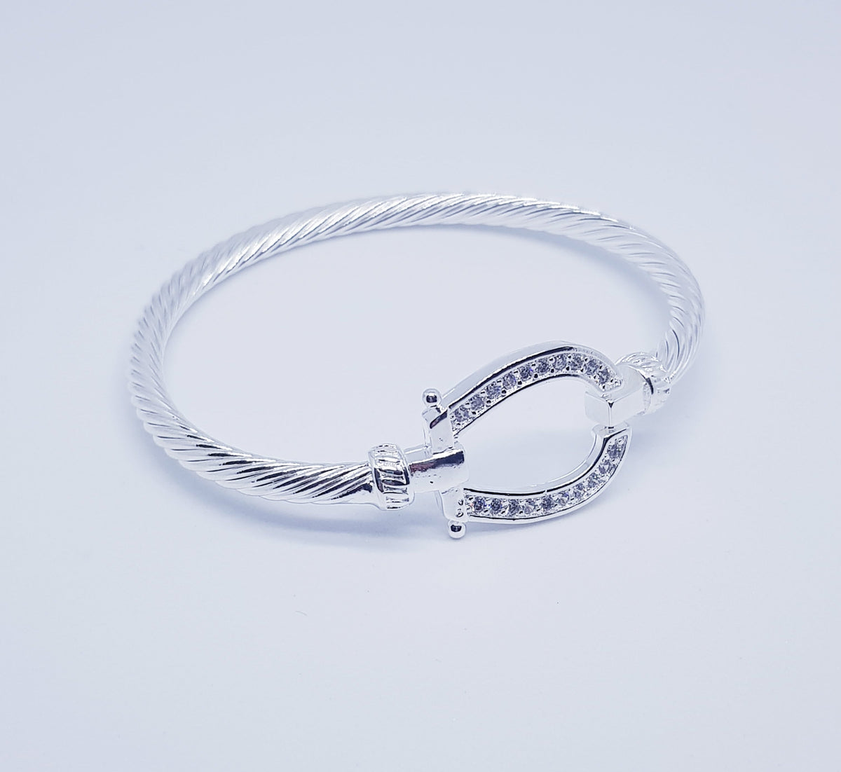 Silver crystal horse shoe bangle / bracelet