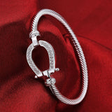 Silver crystal horse shoe bangle / bracelet